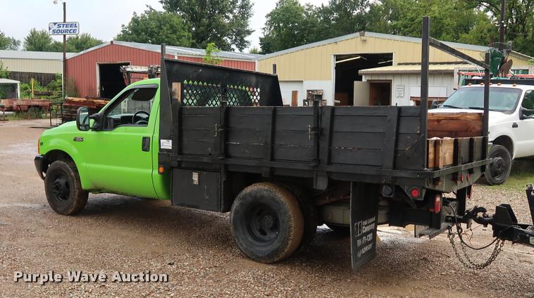 image for item DD1674 2001 Ford F350 Super Duty flatbed pickup truck