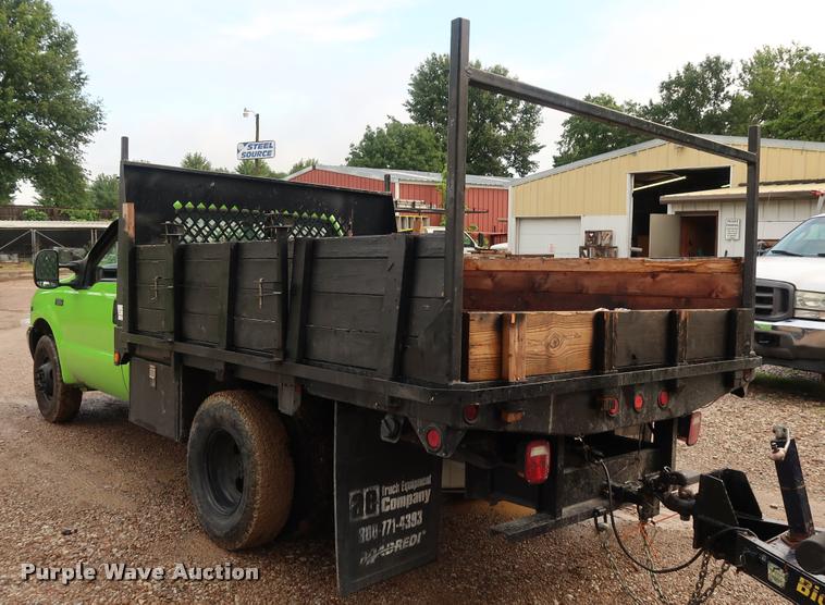 image for item DD1674 2001 Ford F350 Super Duty flatbed pickup truck