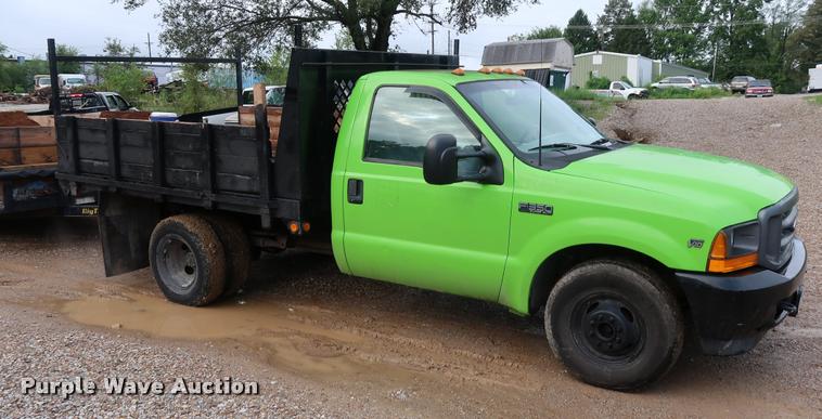 image for item DD1674 2001 Ford F350 Super Duty flatbed pickup truck