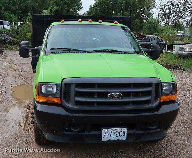 image for item DD1674 2001 Ford F350 Super Duty flatbed pickup truck