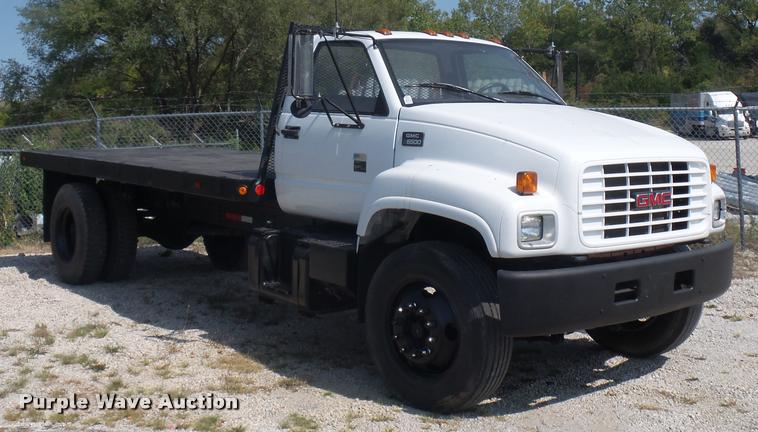 image for item DD2425 1997 GMC C7H042 flatbed pickup truck