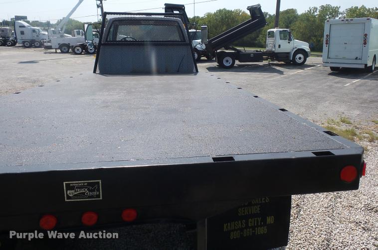 image for item DD2425 1997 GMC C7H042 flatbed pickup truck