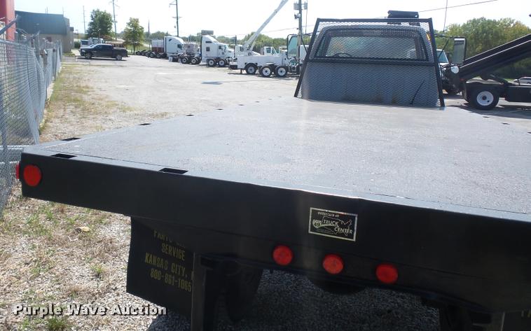 image for item DD2425 1997 GMC C7H042 flatbed pickup truck