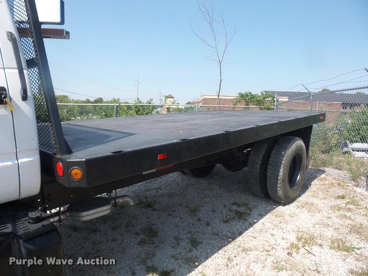 image for item DD2425 1997 GMC C7H042 flatbed pickup truck