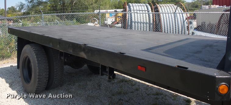 image for item DD2425 1997 GMC C7H042 flatbed pickup truck