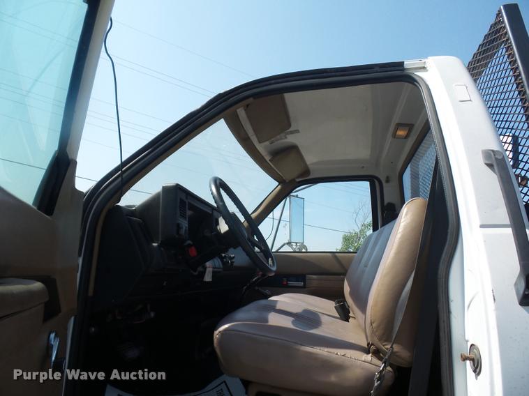 image for item DD2425 1997 GMC C7H042 flatbed pickup truck