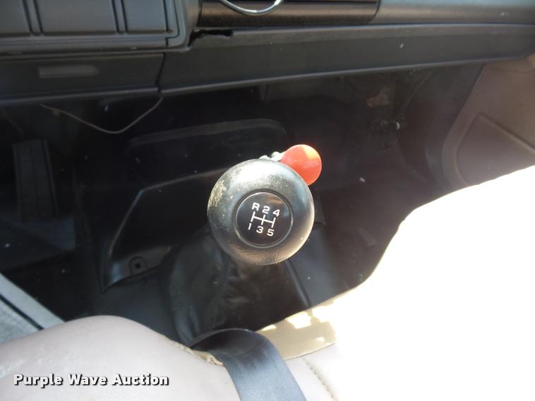 image for item DD2425 1997 GMC C7H042 flatbed pickup truck