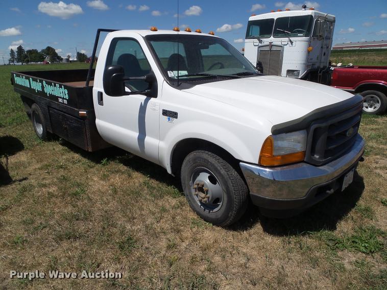 image for item DH9377 2001 Ford F350 Super Duty flatbed pickup truck