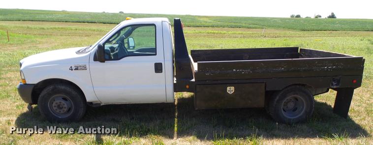 image for item DH9378 2004 Ford F350 Super Duty flatbed pickup truck