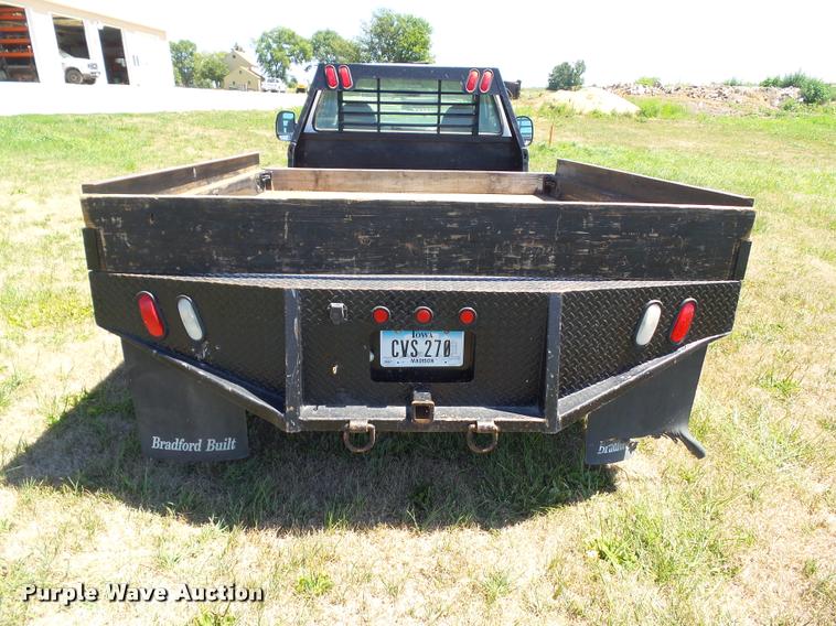 image for item DH9378 2004 Ford F350 Super Duty flatbed pickup truck