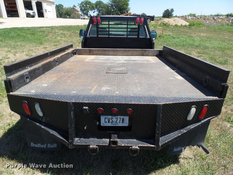image for item DH9378 2004 Ford F350 Super Duty flatbed pickup truck