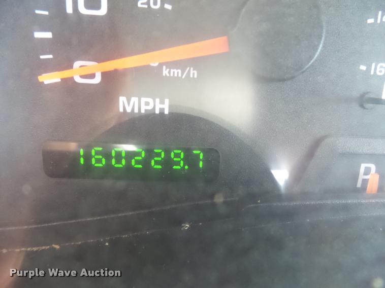 image for item DH9378 2004 Ford F350 Super Duty flatbed pickup truck