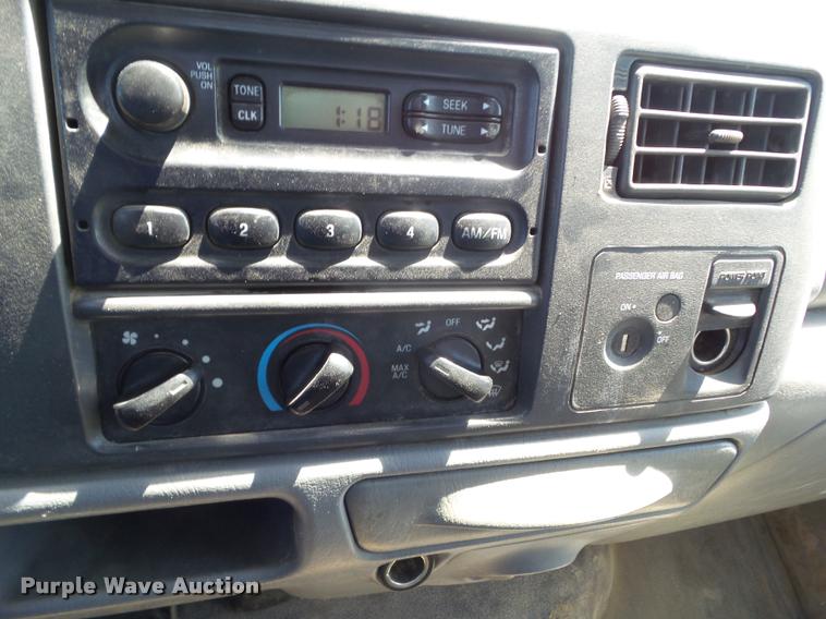 image for item DH9378 2004 Ford F350 Super Duty flatbed pickup truck