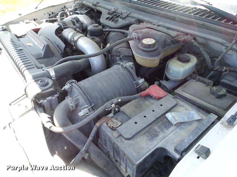 image for item DH9378 2004 Ford F350 Super Duty flatbed pickup truck