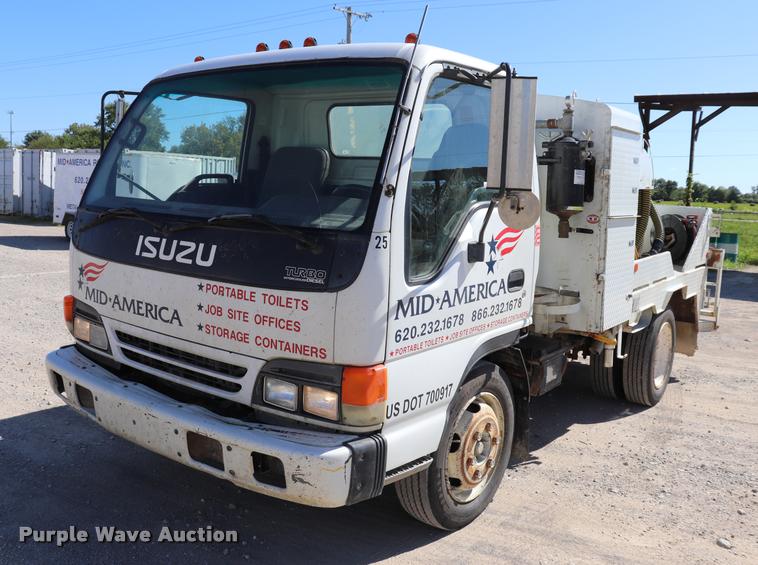 image for item DQ9381 1999 Isuzu NPR vacuum truck