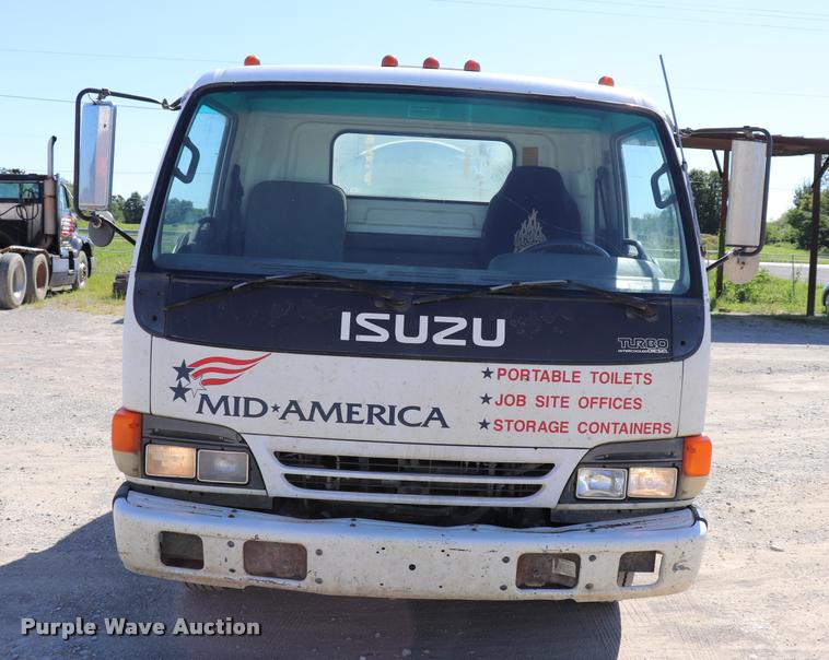 image for item DQ9381 1999 Isuzu NPR vacuum truck
