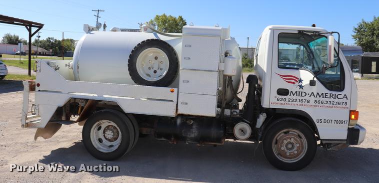 image for item DQ9381 1999 Isuzu NPR vacuum truck