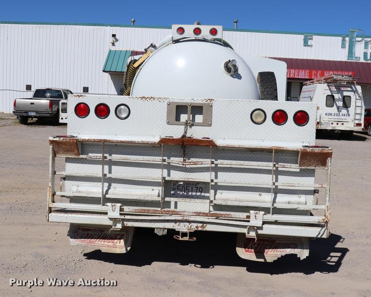 image for item DQ9381 1999 Isuzu NPR vacuum truck