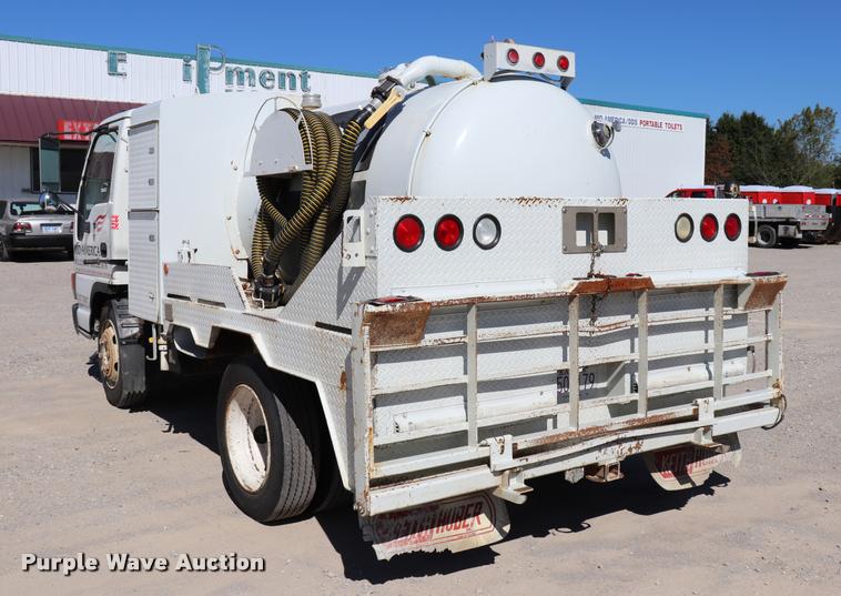 image for item DQ9381 1999 Isuzu NPR vacuum truck