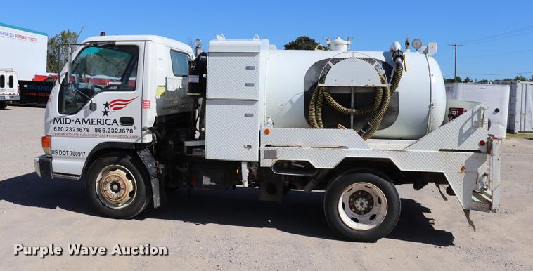 image for item DQ9381 1999 Isuzu NPR vacuum truck