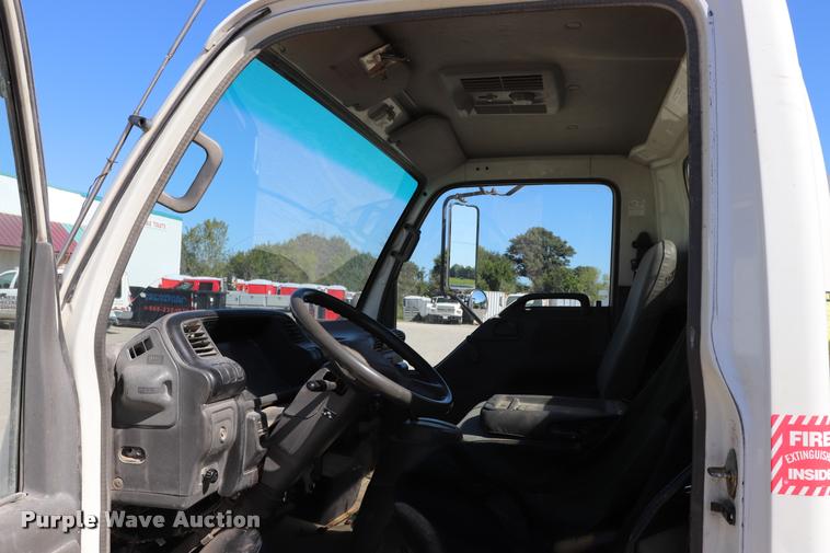 image for item DQ9381 1999 Isuzu NPR vacuum truck