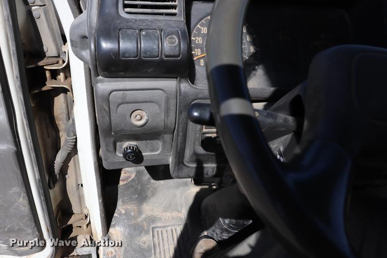 image for item DQ9381 1999 Isuzu NPR vacuum truck