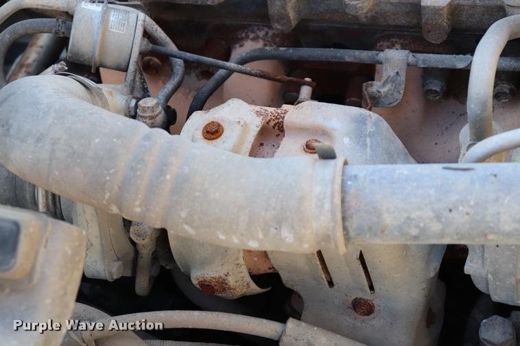 image for item DQ9381 1999 Isuzu NPR vacuum truck