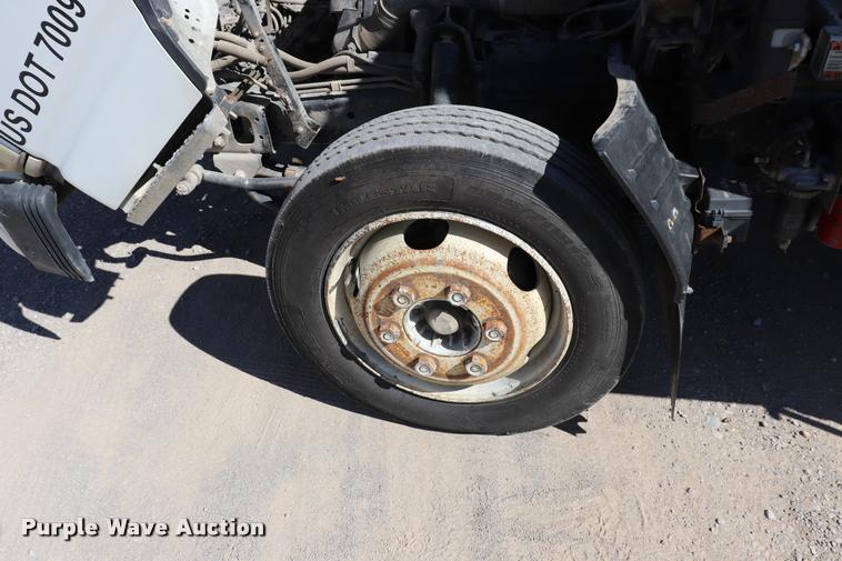 image for item DQ9381 1999 Isuzu NPR vacuum truck