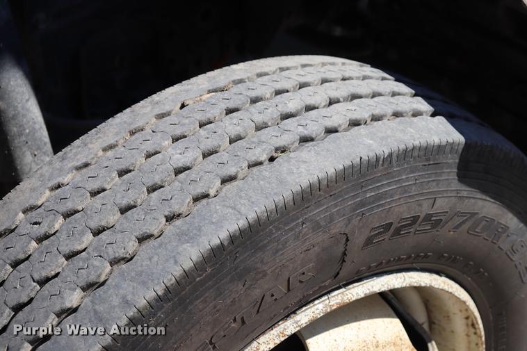 image for item DQ9381 1999 Isuzu NPR vacuum truck