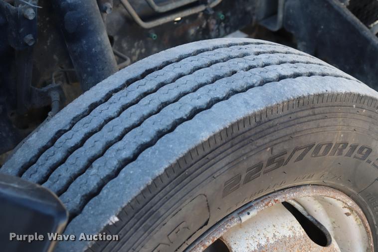 image for item DQ9381 1999 Isuzu NPR vacuum truck