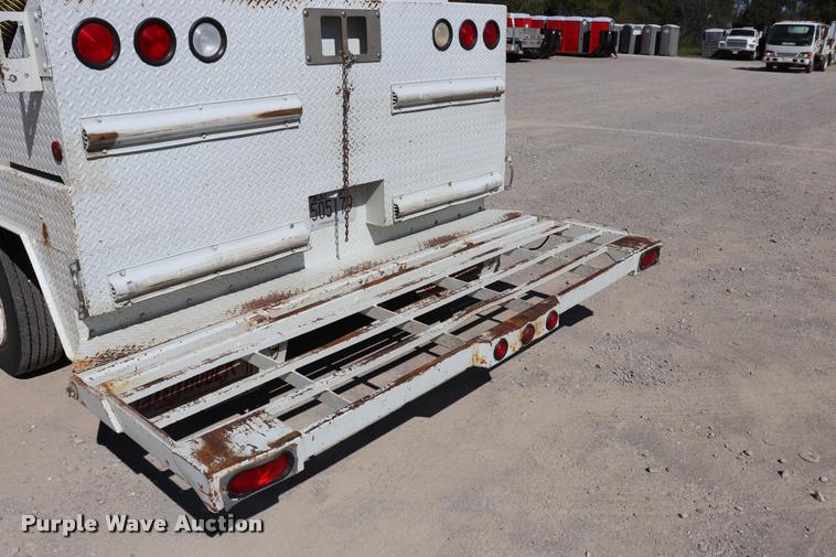 image for item DQ9381 1999 Isuzu NPR vacuum truck