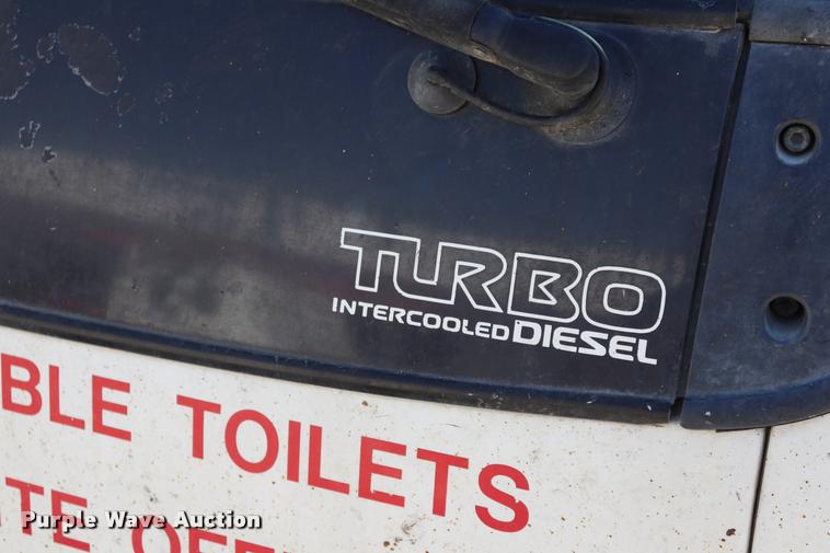 image for item DQ9381 1999 Isuzu NPR vacuum truck