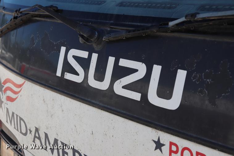 image for item DQ9381 1999 Isuzu NPR vacuum truck