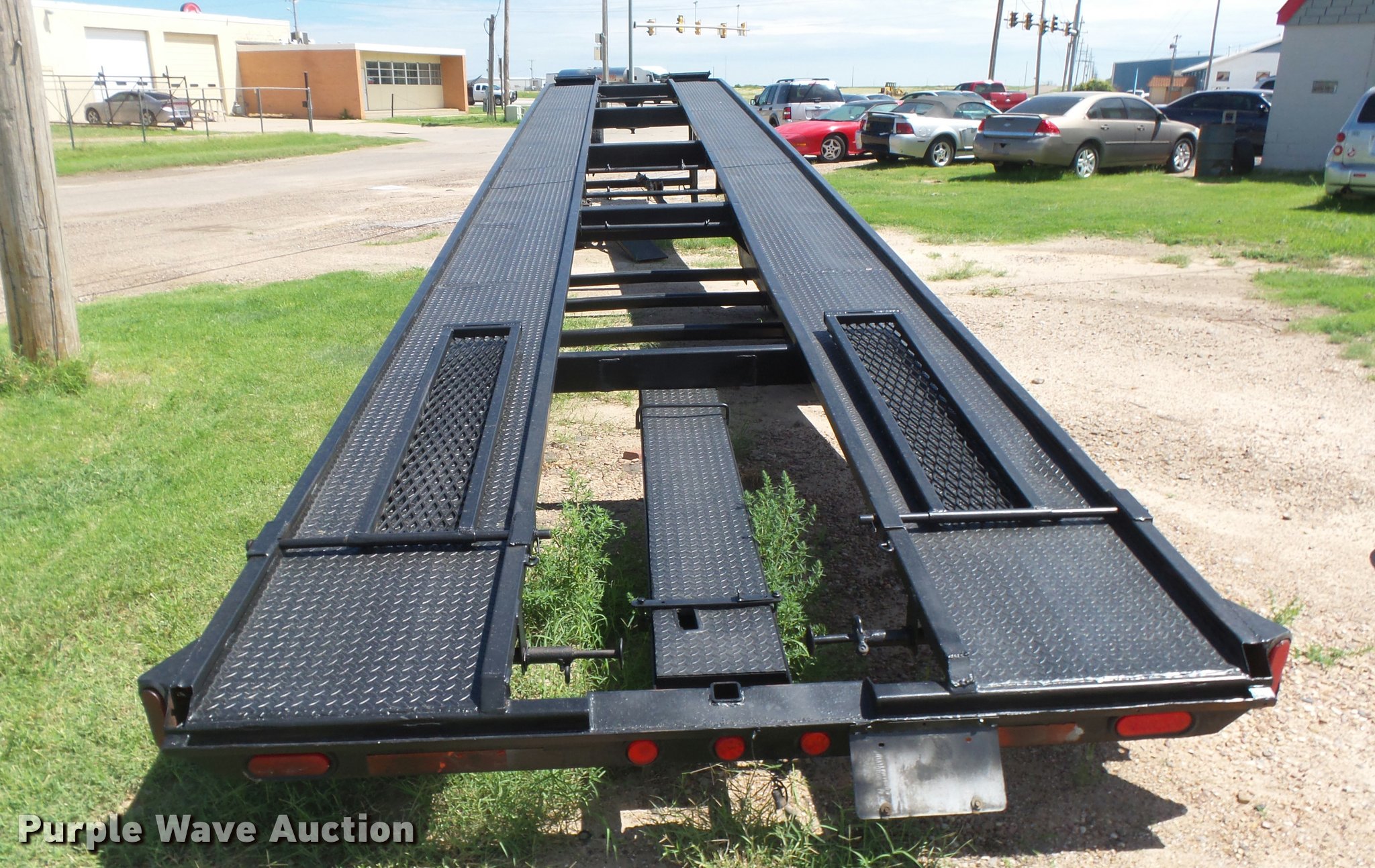 1997 UHaul car carrier trailer in Liberal, KS Item DC3928 sold