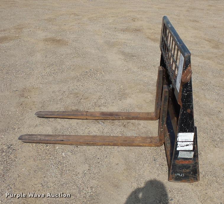 Caterpillar skid steer pallet forks in Roseville, MN Item DC2743 sold