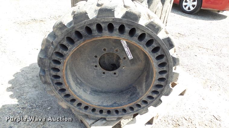image for item DT9099 (4) MitL Solid Flex 12-16.5 skid steer tires