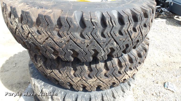 image for item DT9100 (4) Wolf Paws 7.50-16LT skid steer tires