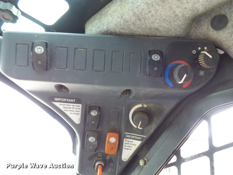 image for item K1791 2012 John Deere 326D skid steer