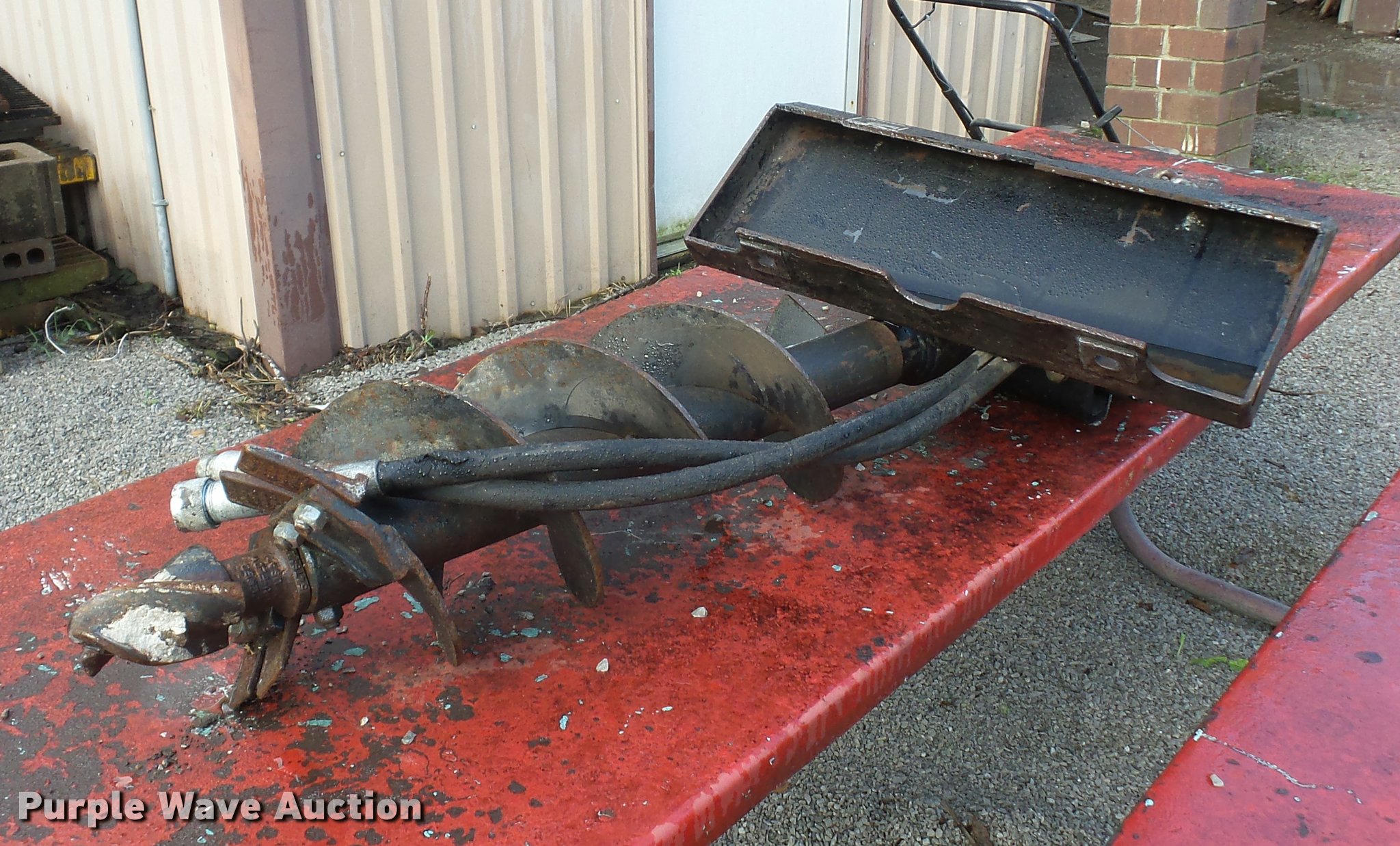 Mini skid steer auger in Independence, MO Item DD1580 sold Purple Wave
