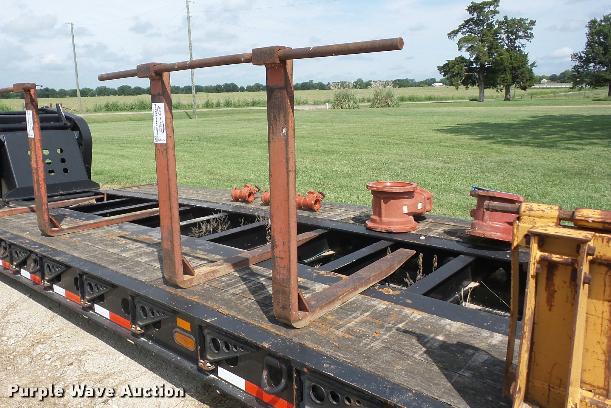 Backhoe pallet forks in Oswego, KS Item K6425 sold Purple Wave