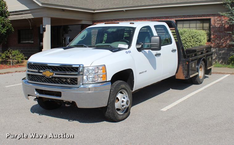 image for item L3222 2013 Chevrolet Silverado 3500HD Crew Cab flatbed pickup truck