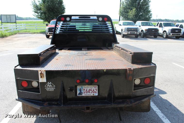 image for item L3222 2013 Chevrolet Silverado 3500HD Crew Cab flatbed pickup truck