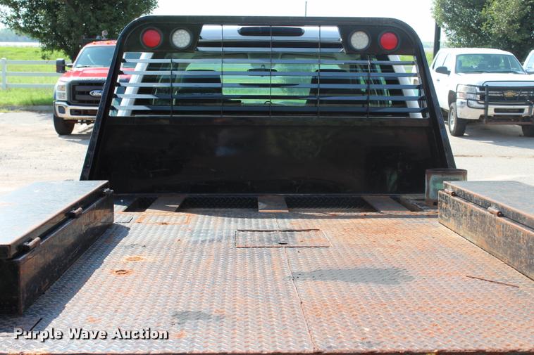 image for item L3222 2013 Chevrolet Silverado 3500HD Crew Cab flatbed pickup truck