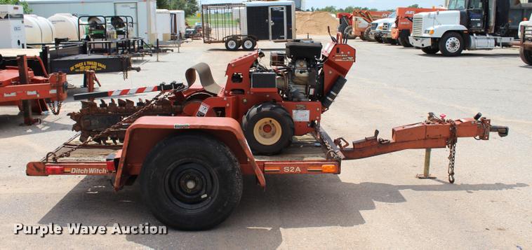 image for item L3224 2011 Ditch Witch RT12 trencher and trailer