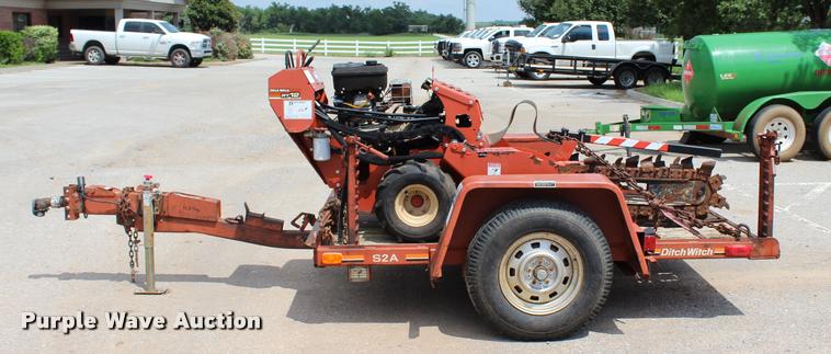 image for item L3224 2011 Ditch Witch RT12 trencher and trailer