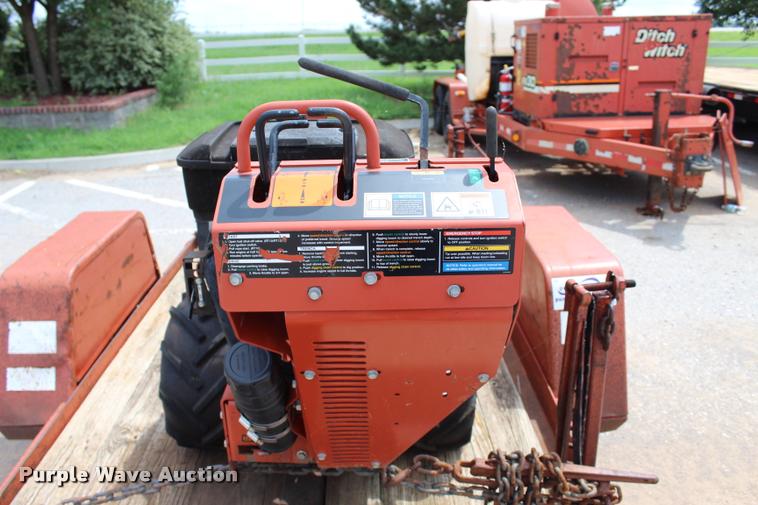 image for item L3224 2011 Ditch Witch RT12 trencher and trailer