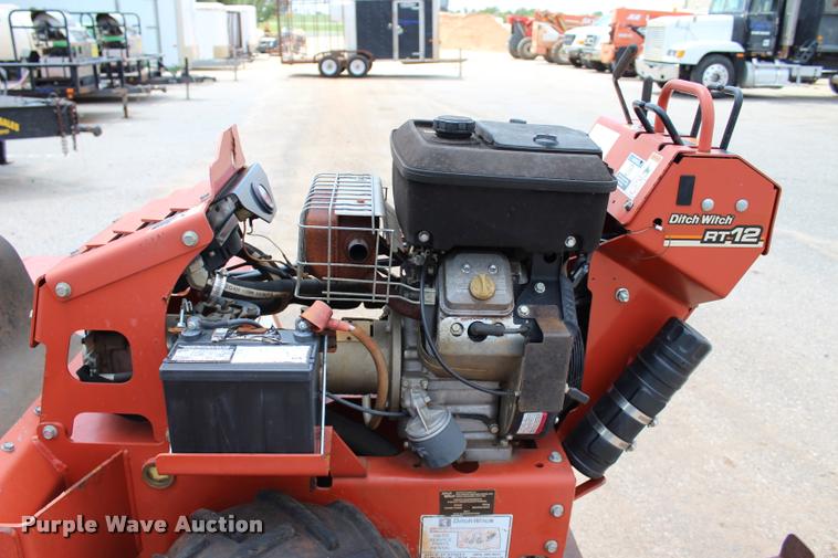 image for item L3224 2011 Ditch Witch RT12 trencher and trailer