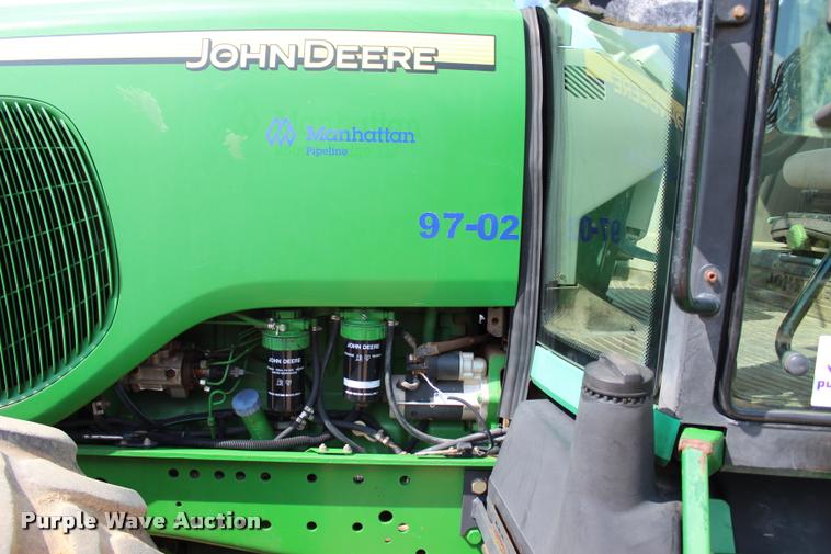 image for item L3237 2005 John Deere 7520 MFWD tractor