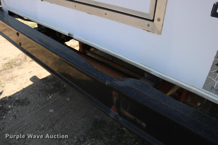 image for item DB9387 2003 Ford E350 Super Duty shuttle bus