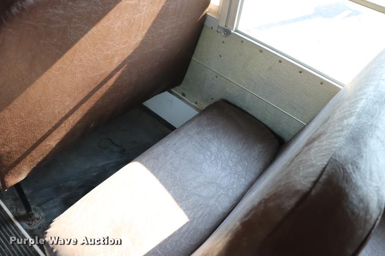 image for item DQ9366 1999 GMC B7 school bus